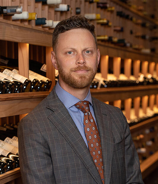 Portrait of Andrew Adelson in The French Laundry Wine Cellar